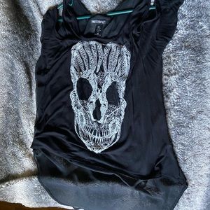 L open shoulder shirt with a skull on it